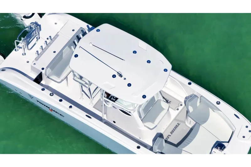 Slide: The Image of Aerial view of Twin Vee 240 GFX2 CC boat, 2026 model. - 3