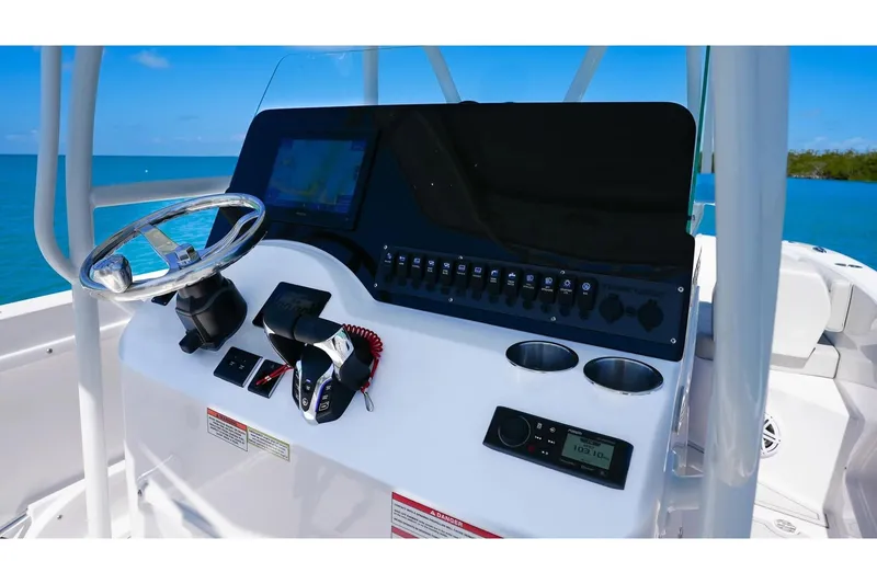 Slide: The Image of Helm console of Twin Vee 240 GFX2 CC boat, year 2026. - 9