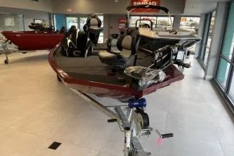 Slide: The Image of 2026 Crestliner XF 179 boat displayed in showroom, featuring sleek design and modern equipment. - 3