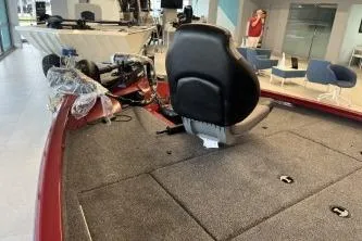 Slide: The Image of 2026 Crestliner XF 179 boat interior with seating and equipment in showroom. - 8