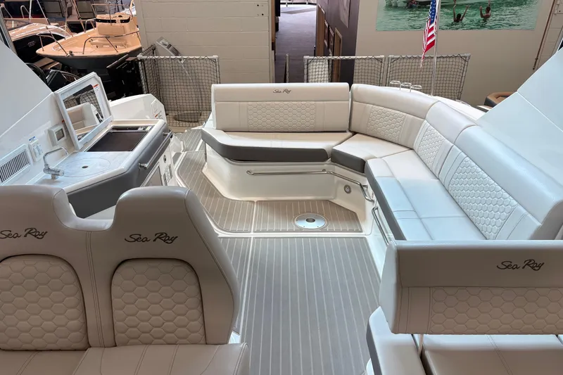 Slide: The Image of Luxurious interior of 2026 Sea Ray Sundancer 320 yacht with elegant seating. - 14