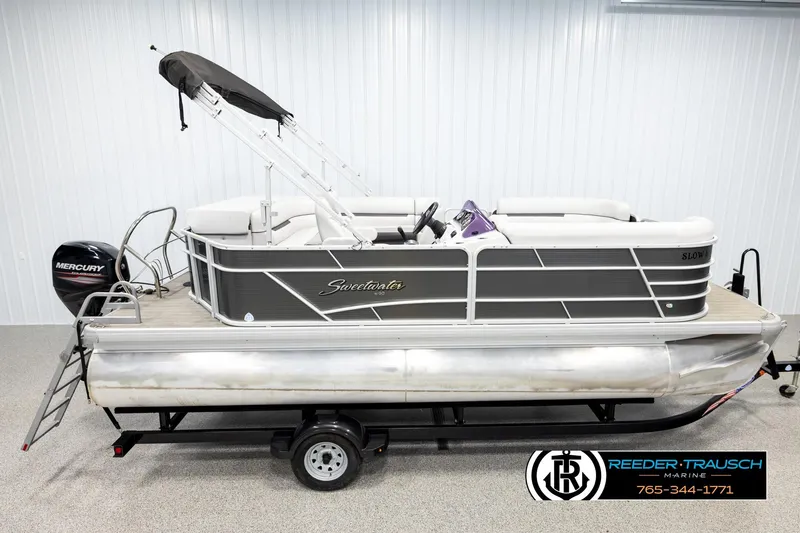 The Image of 2019 Sweetwater SW2086c pontoon boat with Mercury engine on trailer. - 1