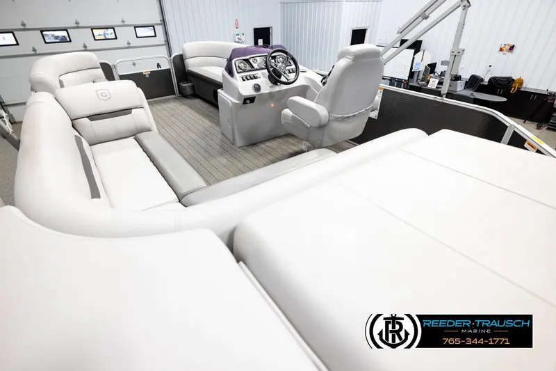 Slide: The Image of Interior of 2019 Sweetwater SW2086c pontoon boat with plush seating and modern helm. - 11