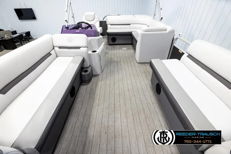 Slide: The Image of 2019 Sweetwater SW2086c pontoon boat interior with plush seating and modern design. - 13