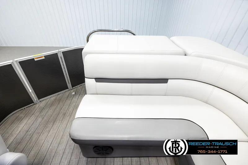 Slide: The Image of 2019 Sweetwater SW2086c pontoon boat interior with white seating and gray flooring. - 15