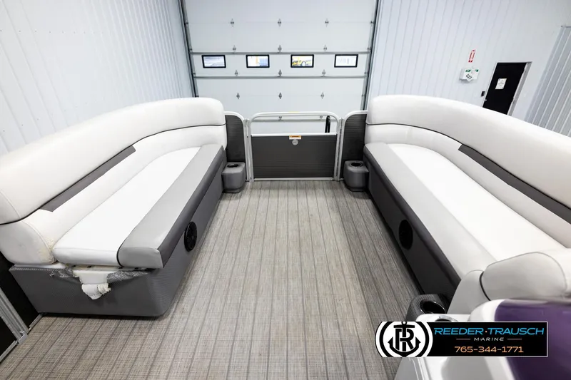 Slide: The Image of Interior of a 2019 Sweetwater SW2086c pontoon boat with white and gray seating. - 18