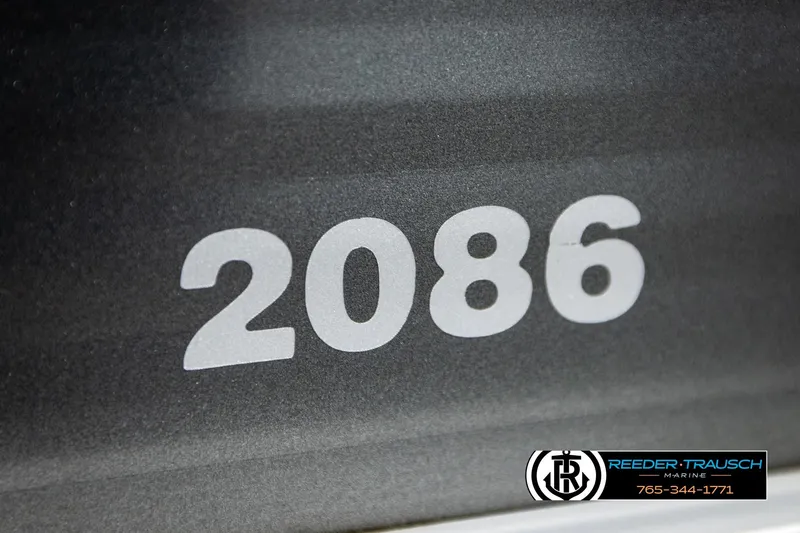 Slide: The Image of Close-up of Sweetwater SW2086c model number on a dark surface, 2019. - 48