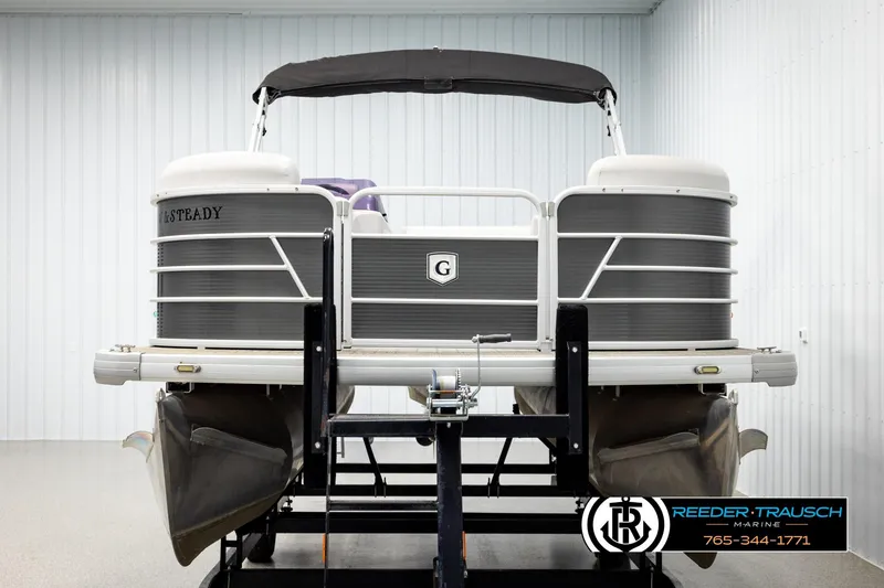 Slide: The Image of 2019 Sweetwater SW2086c pontoon boat on display in a showroom. - 8