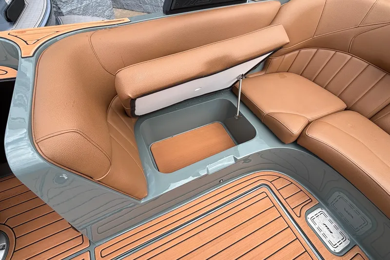 Slide: The Image of Luxurious seating area of 2026 MB B52 23 Classic boat with storage compartment. - 17