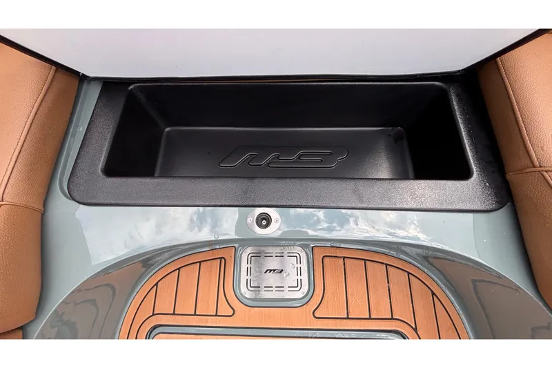 Slide: The Image of 2026 MB B52 23 Classic interior storage compartment with wood accents and leather seating. - 19