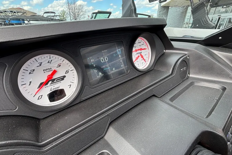 Slide: The Image of Dashboard of 2026 MB B52 23 Classic boat with RPM gauges and digital display. - 27