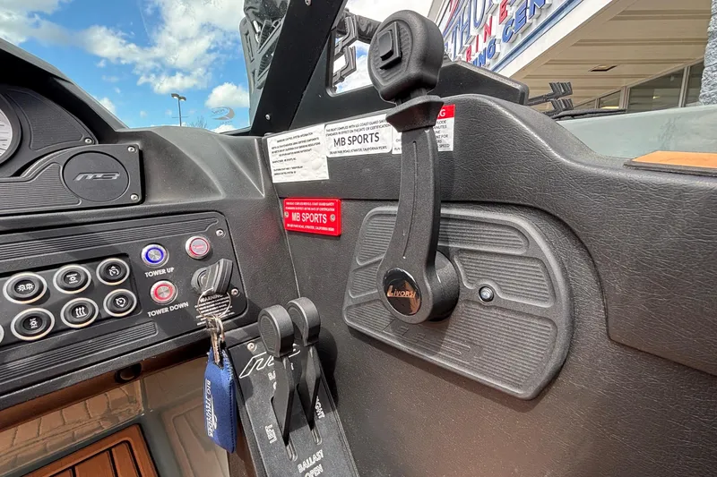 Slide: The Image of Control panel of 2026 MB B52 23 Classic boat with throttle and switches. - 28
