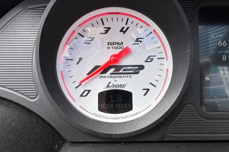 Slide: The Image of Tachometer of 2026 MB B52 23 Classic showing RPM and total hours. - 30