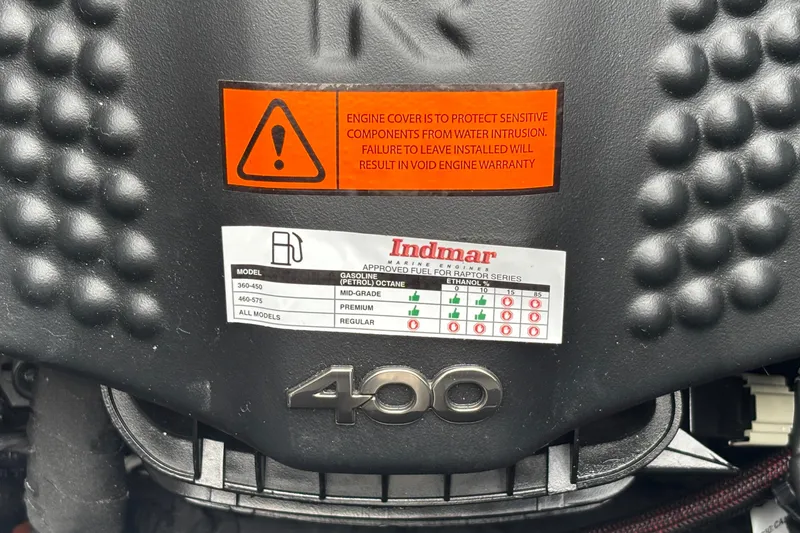 Slide: The Image of Engine cover of 2026 MB B52 23 Classic with fuel specifications and warning label. - 34