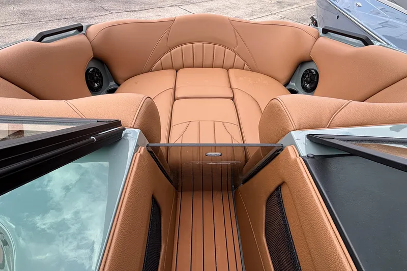 Slide: The Image of Luxurious interior of 2026 MB B52 23 Classic boat with tan leather seating. - 36