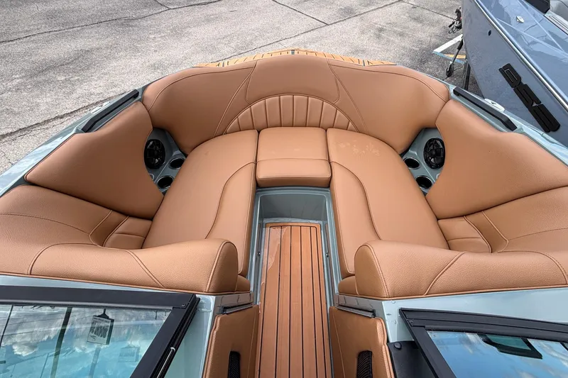 Slide: The Image of Luxurious interior of 2026 MB B52 23 Classic boat with tan leather seating. - 37