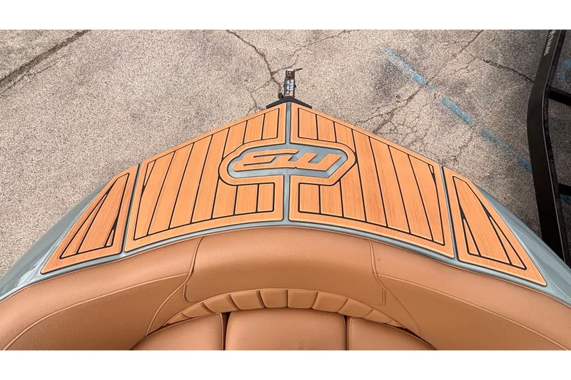 Slide: The Image of Bow of 2026 MB B52 23 Classic boat with teak decking and tan seating. - 42