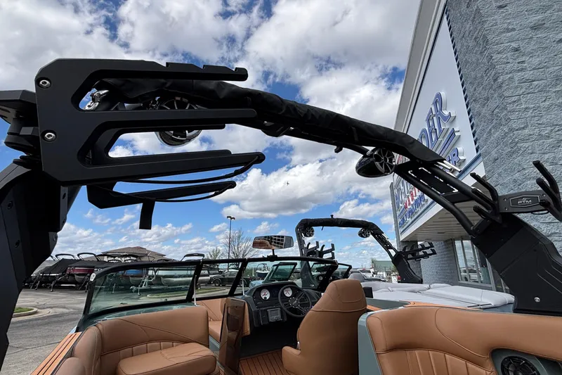 Slide: The Image of 2026 MB B52 23 Classic boat with sleek design and luxurious interior at dealership. - 43