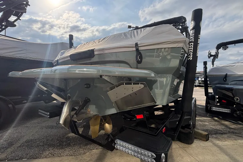 Slide: The Image of Luxurious interior of 2026 MB B52 23 Classic boat with tan leather seating. - 5