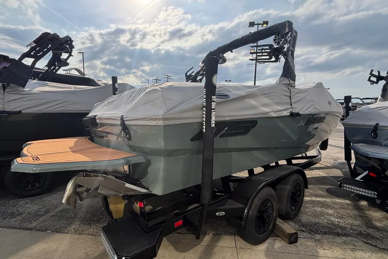 Slide: The Image of Luxurious interior of 2026 MB B52 23 Classic boat with tan leather seating. - 6