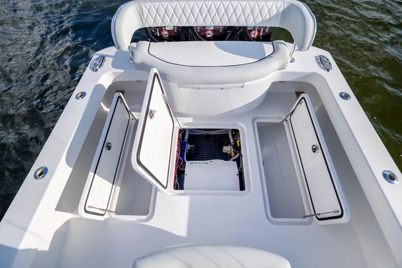 Slide: The Image of Open storage compartments on a 2018 Tribute 37 boat deck. - 4