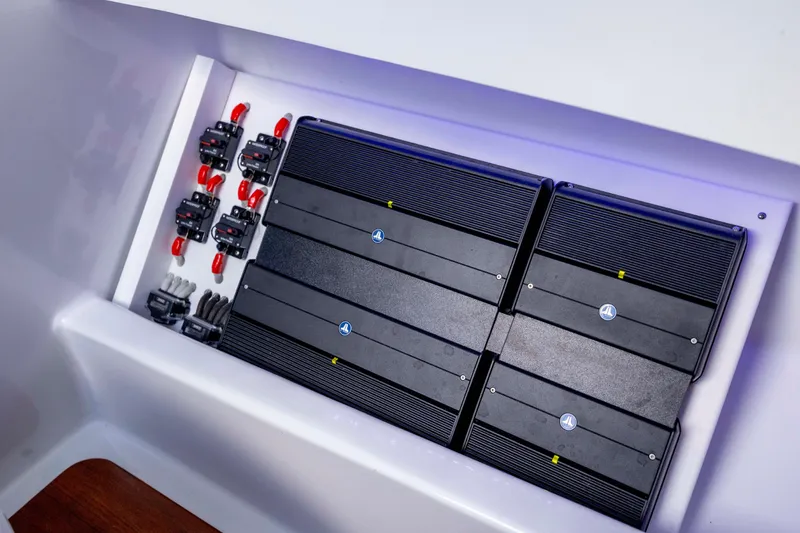 Slide: The Image of Electrical system in 2018 Tribute 37 boat, featuring multiple circuit breakers and amplifiers. - 7