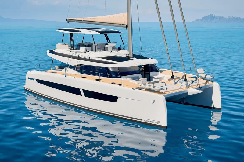 Slide: The Image of 2026 Fountaine Pajot 55 catamaran sailing on calm blue waters. - 20