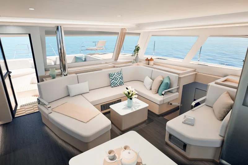Slide: The Image of Luxurious interior of 2026 Fountaine Pajot 55 catamaran with elegant seating and ocean view. - 32