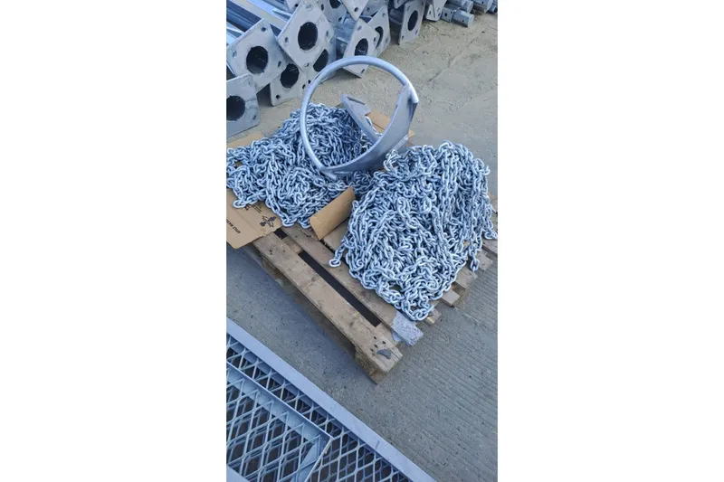 Slide: The Image of Pallet with metal chains and parts, Nordic 44, 1980 model. - 12