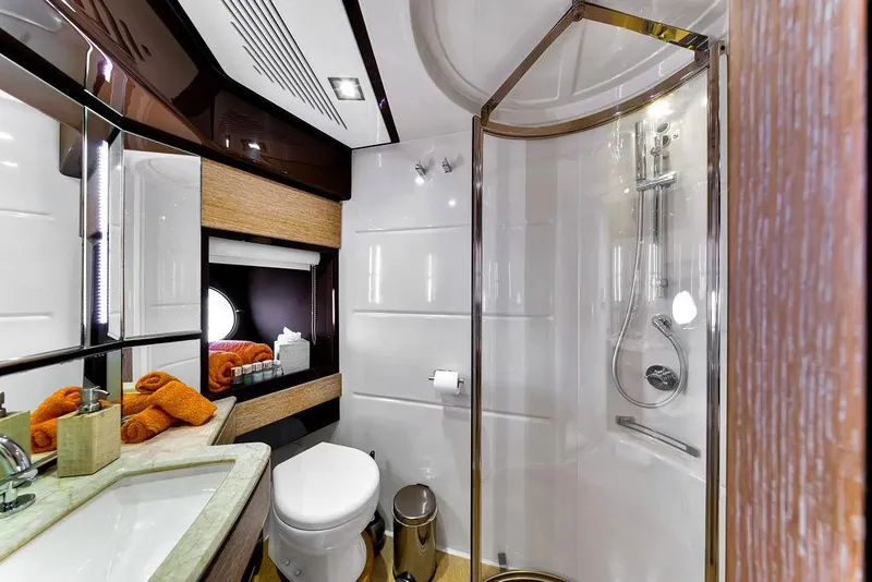 Slide: The Image of Luxurious bathroom in 2011 Azimut 70 yacht with modern shower and elegant fixtures. - 92