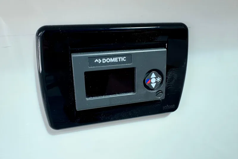 Slide: The Image of Dometic control panel on Parker 247 Explorer 2026 boat, featuring temperature and fan settings. - 7