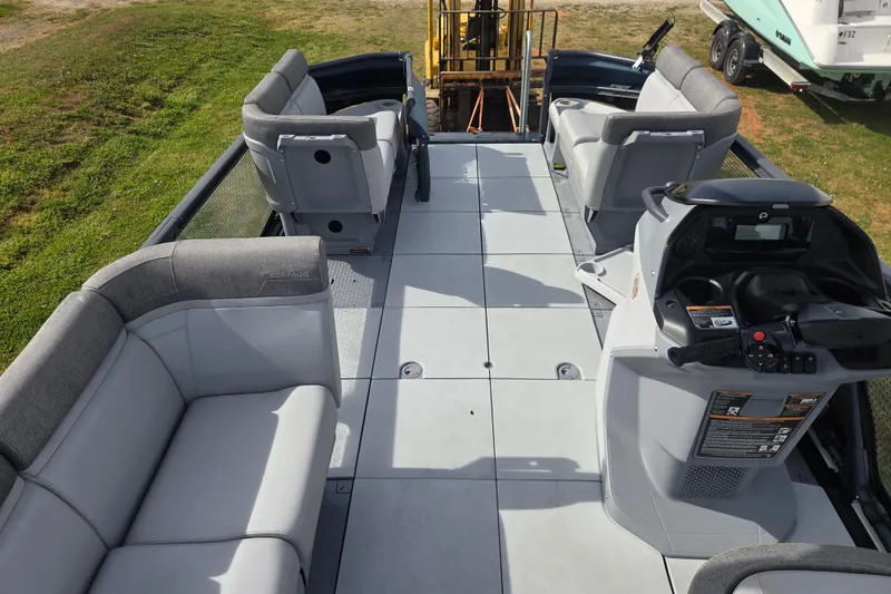 Slide: The Image of 2024 Sea-Doo Switch Cruise 21 interior with spacious seating and modern controls. - 12