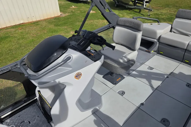 Slide: The Image of 2024 Sea-Doo Switch Cruise 21 interior with steering console and seating arrangement. - 15