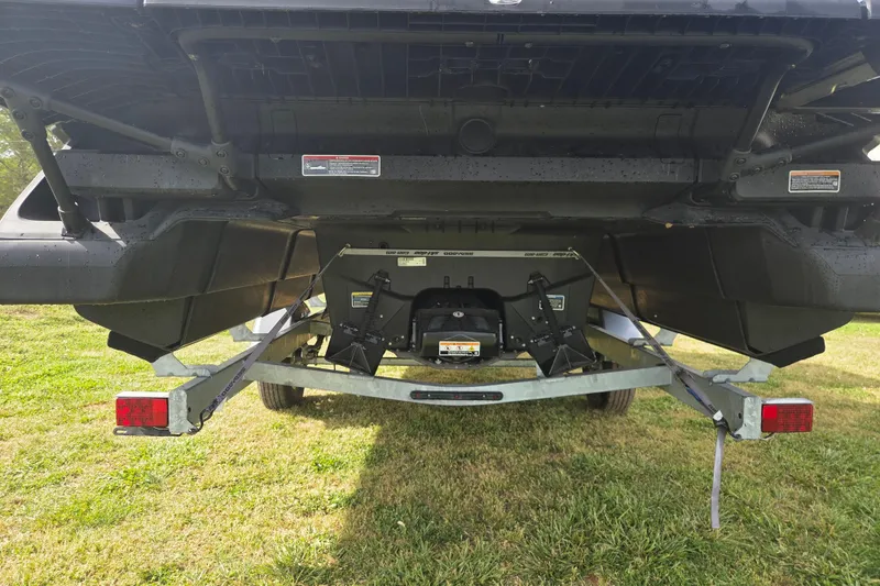 Slide: The Image of Rear view of 2024 Sea-Doo Switch Cruise 21 on trailer, showcasing hull and trailer details. - 6