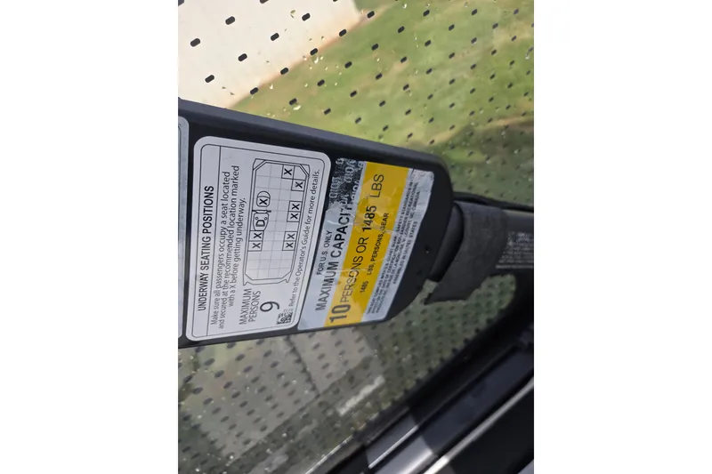 Slide: The Image of 2024 Sea-Doo Switch Cruise 21 capacity label, showing maximum 10 persons or 1485 lbs. - 7