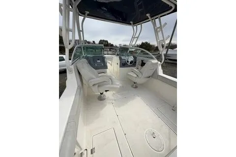 Slide: The Image of 2019 Striper 230 DC boat interior with dual consoles and seating. - 22
