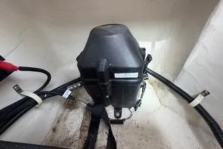 Slide: The Image of 2019 Striper 230 DC boat component with wiring and protective casing. - 39