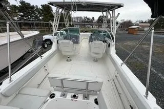 Slide: The Image of 2019 Striper 230 DC boat interior with seating and steering console. - 5