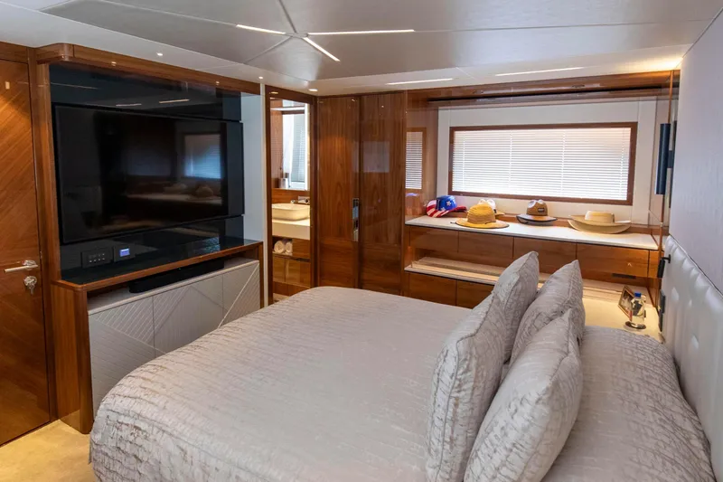 Slide: The Image of Luxurious bedroom interior of 2021 Sunseeker Manhattan 68 yacht with modern amenities. - 10