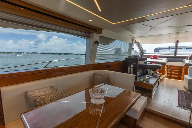 Slide: The Image of Luxurious interior of 2021 Sunseeker Manhattan 68 yacht with elegant seating and scenic ocean view. - 109