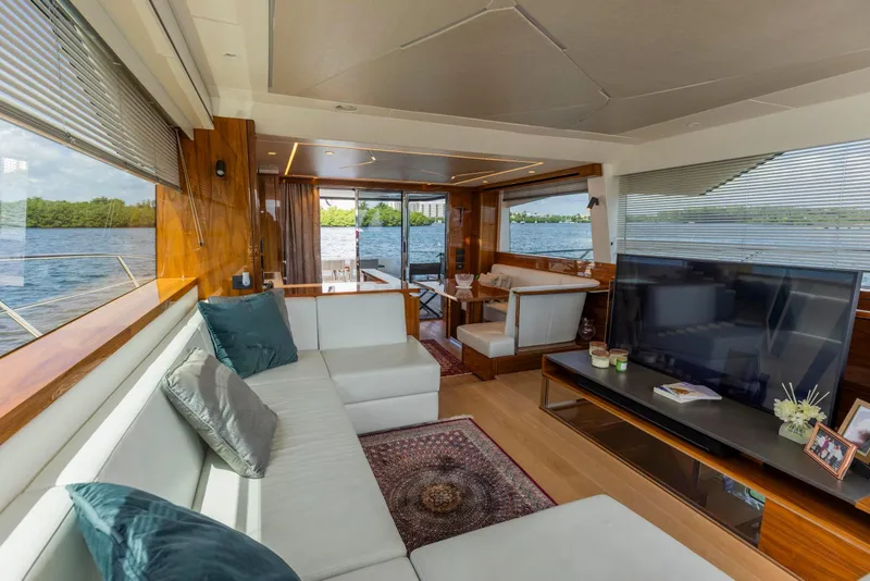 Slide: The Image of Luxurious interior of 2021 Sunseeker Manhattan 68 yacht with elegant seating and scenic water views. - 113