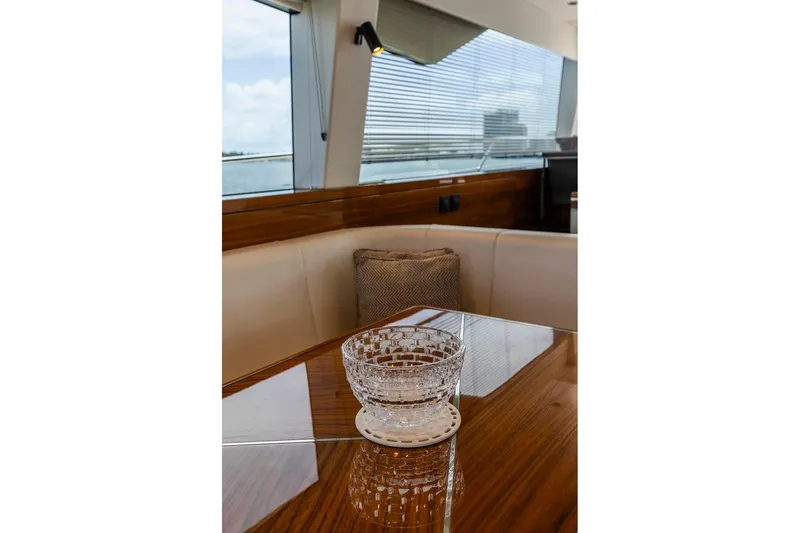 Slide: The Image of Luxurious interior of 2021 Sunseeker Manhattan 68 yacht with elegant glass bowl on table. - 118