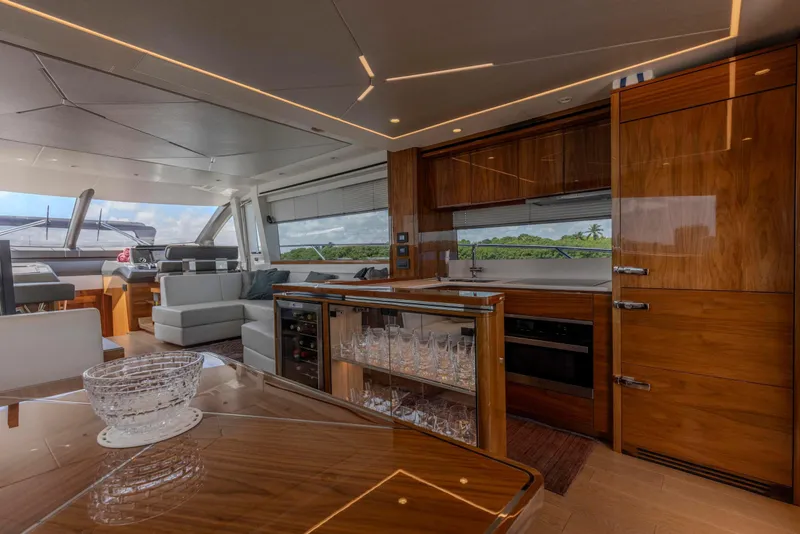 Slide: The Image of Luxurious interior of 2021 Sunseeker Manhattan 68 yacht with modern kitchen and seating area. - 120