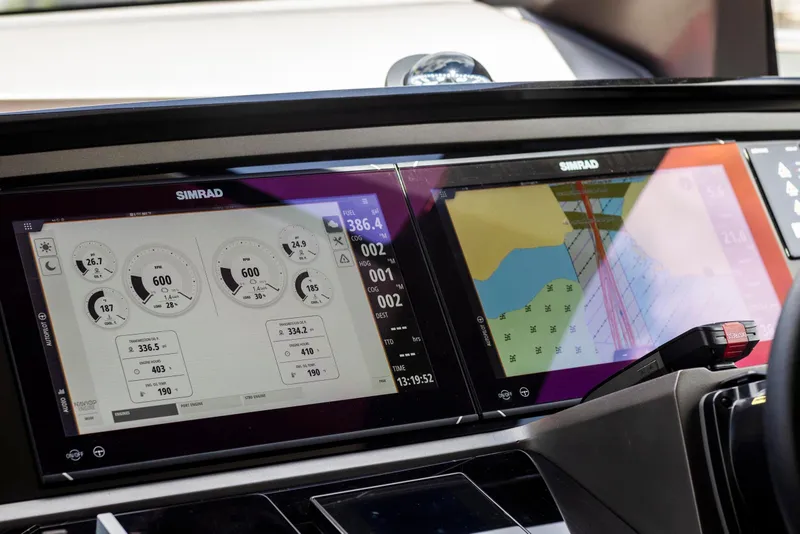 Slide: The Image of Simrad navigation display on 2021 Sunseeker Manhattan 68 yacht dashboard. - 133