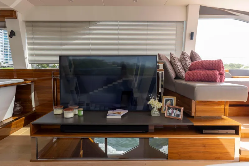 Slide: The Image of Luxurious interior of 2021 Sunseeker Manhattan 68 yacht with TV and seating area. - 17