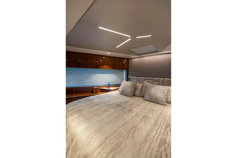 Slide: The Image of Luxurious bedroom interior of 2021 Sunseeker Manhattan 68 yacht with modern lighting. - 22