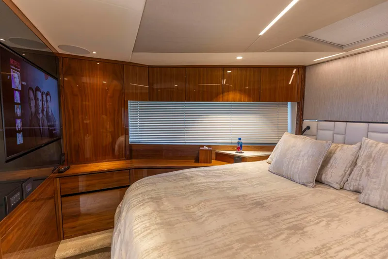 Slide: The Image of Luxurious bedroom interior of 2021 Sunseeker Manhattan 68 yacht with modern amenities. - 26