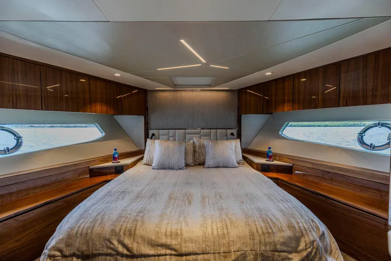 Slide: The Image of Luxurious bedroom interior of 2021 Sunseeker Manhattan 68 yacht with elegant wood finishes. - 34