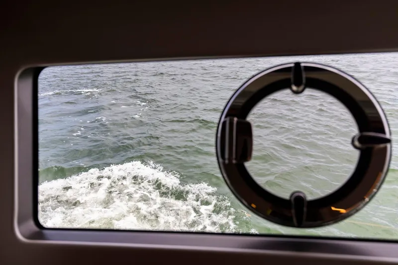 Slide: The Image of Porthole view of ocean from 2021 Sunseeker Manhattan 68 yacht. - 38