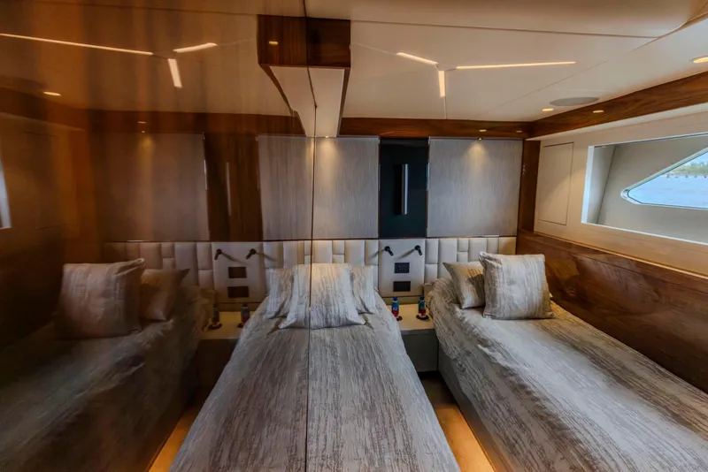Slide: The Image of Luxurious cabin interior of 2021 Sunseeker Manhattan 68 yacht with twin beds. - 45